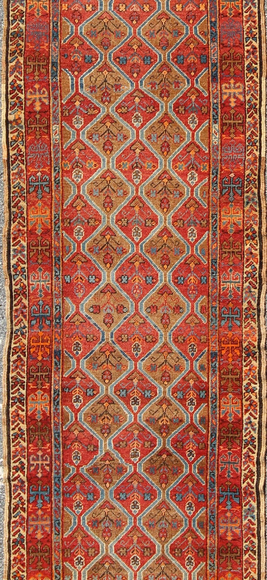 Antique Serapi Runner with All - Over, Multicolor Geometric Design Measures: 2'10'' x 10'9''. This antique Serapi - Heriz displays a charming and rich combination of various jewel tones. The geometric diamond shapes are repeated in different form... - Keivan Woven ArtsN15 - 0502 - 7103Rug