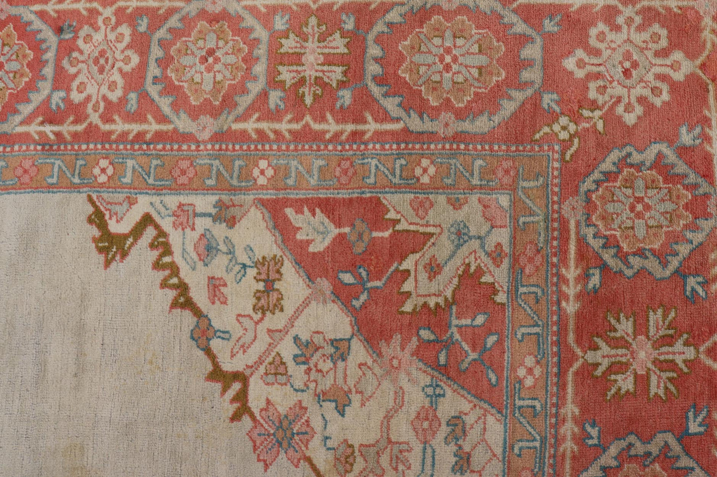 Large antique Turkish Oushak rug in light green background and coral border. Keivan Woven Arts / rug N15 - 1002, country of origin / type: Turkey / Oushak, circa Early - 20th century. Measures: 13'4 x 18'. Delicate light sea - foam, taupe and coral imb... - Keivan Woven ArtsN15 - 1002 - 114Rug