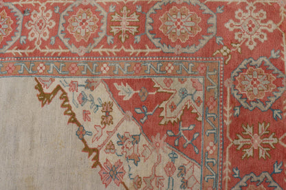 Large antique Turkish Oushak rug in light green background and coral border. Keivan Woven Arts / rug N15 - 1002, country of origin / type: Turkey / Oushak, circa Early - 20th century. Measures: 13'4 x 18'. Delicate light sea - foam, taupe and coral imb... - Keivan Woven ArtsN15 - 1002 - 114Rug