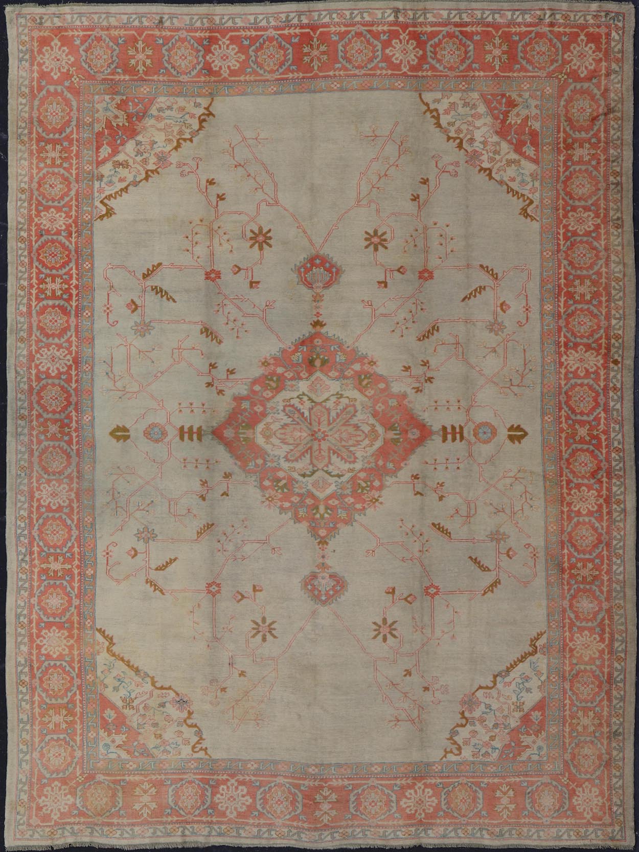 Large antique Turkish Oushak rug in light green background and coral border. Keivan Woven Arts / rug N15 - 1002, country of origin / type: Turkey / Oushak, circa Early - 20th century. Measures: 13'4 x 18'. Delicate light sea - foam, taupe and coral imb... - Keivan Woven ArtsN15 - 1002 - 114Rug