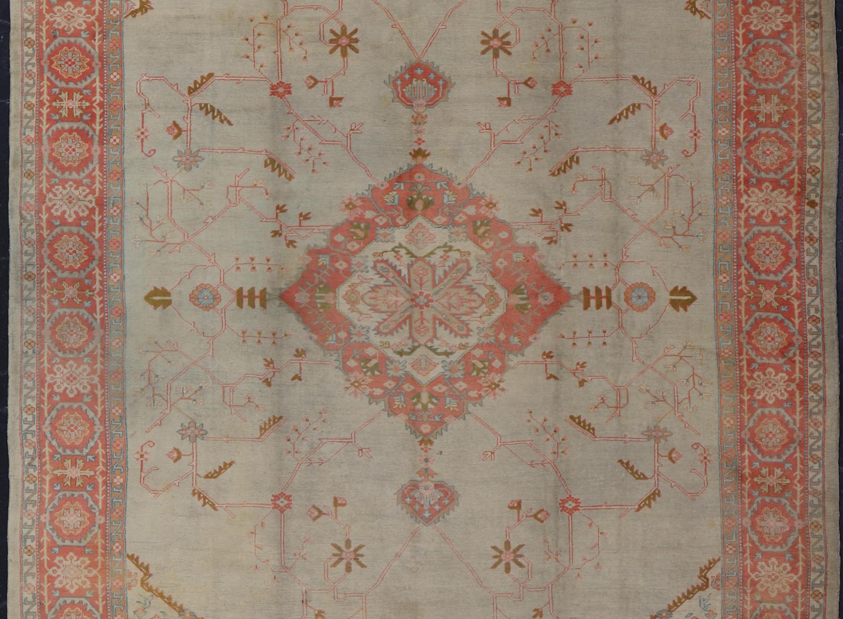 Large antique Turkish Oushak rug in light green background and coral border. Keivan Woven Arts / rug N15 - 1002, country of origin / type: Turkey / Oushak, circa Early - 20th century. Measures: 13'4 x 18'. Delicate light sea - foam, taupe and coral imb... - Keivan Woven ArtsN15 - 1002 - 114Rug