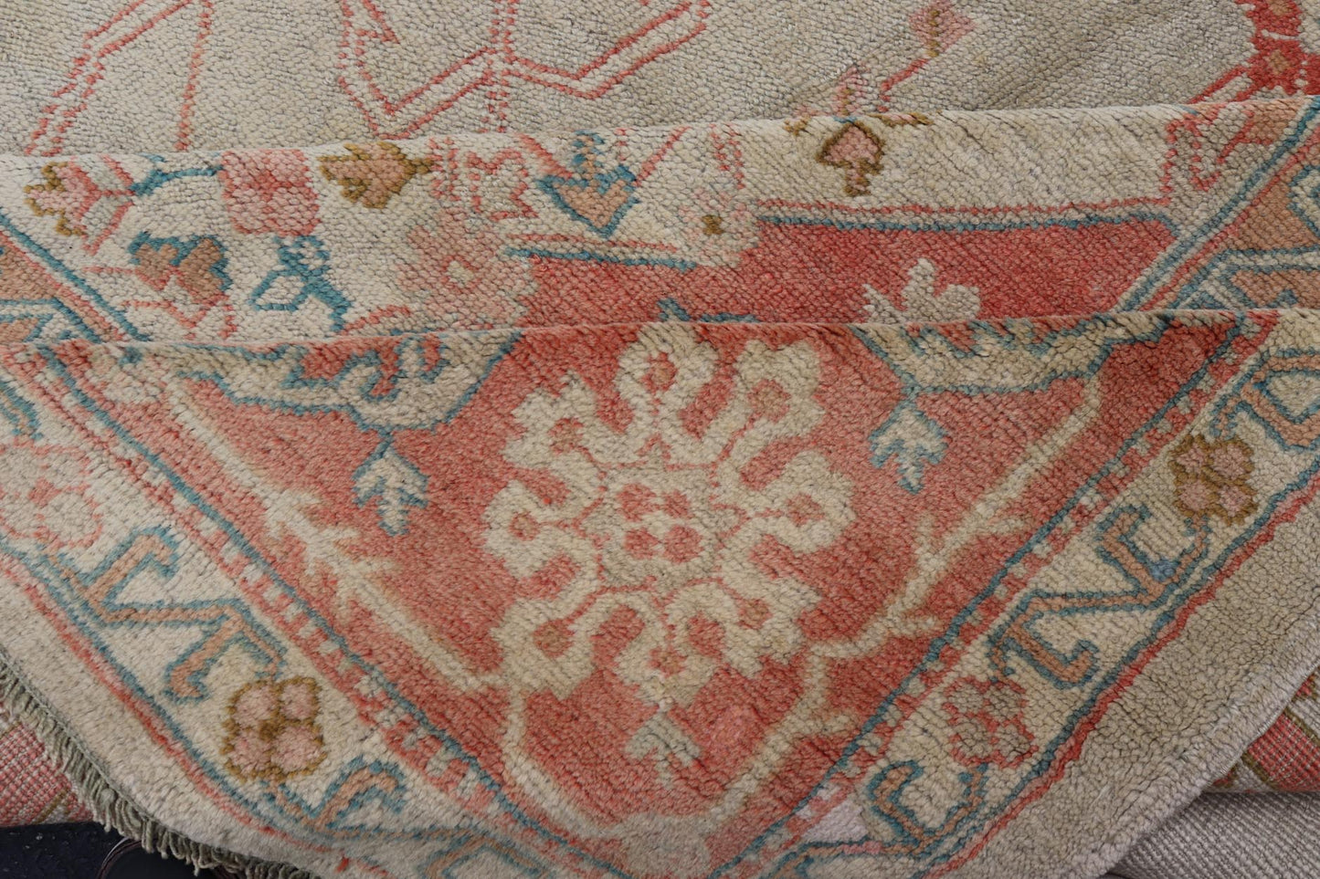 Large antique Turkish Oushak rug in light green background and coral border. Keivan Woven Arts / rug N15 - 1002, country of origin / type: Turkey / Oushak, circa Early - 20th century. Measures: 13'4 x 18'. Delicate light sea - foam, taupe and coral imb... - Keivan Woven ArtsN15 - 1002 - 114Rug