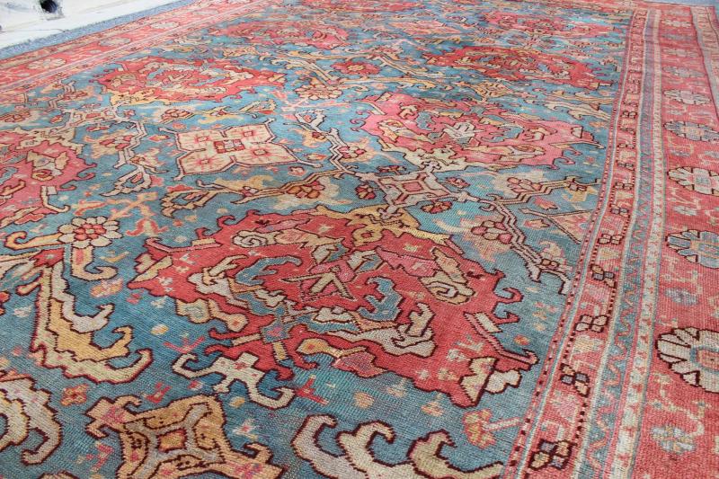 Antique Colorful Turkish Oushak Rug with Teal Color This wonderful Turkish Oushak rug is set on a teal - blue background. The eight over - sized medallions are opulent with two shades of coral and the same accent colors in the center field. The back... - Keivan Woven ArtsN15 - 1003 - 7014Rug