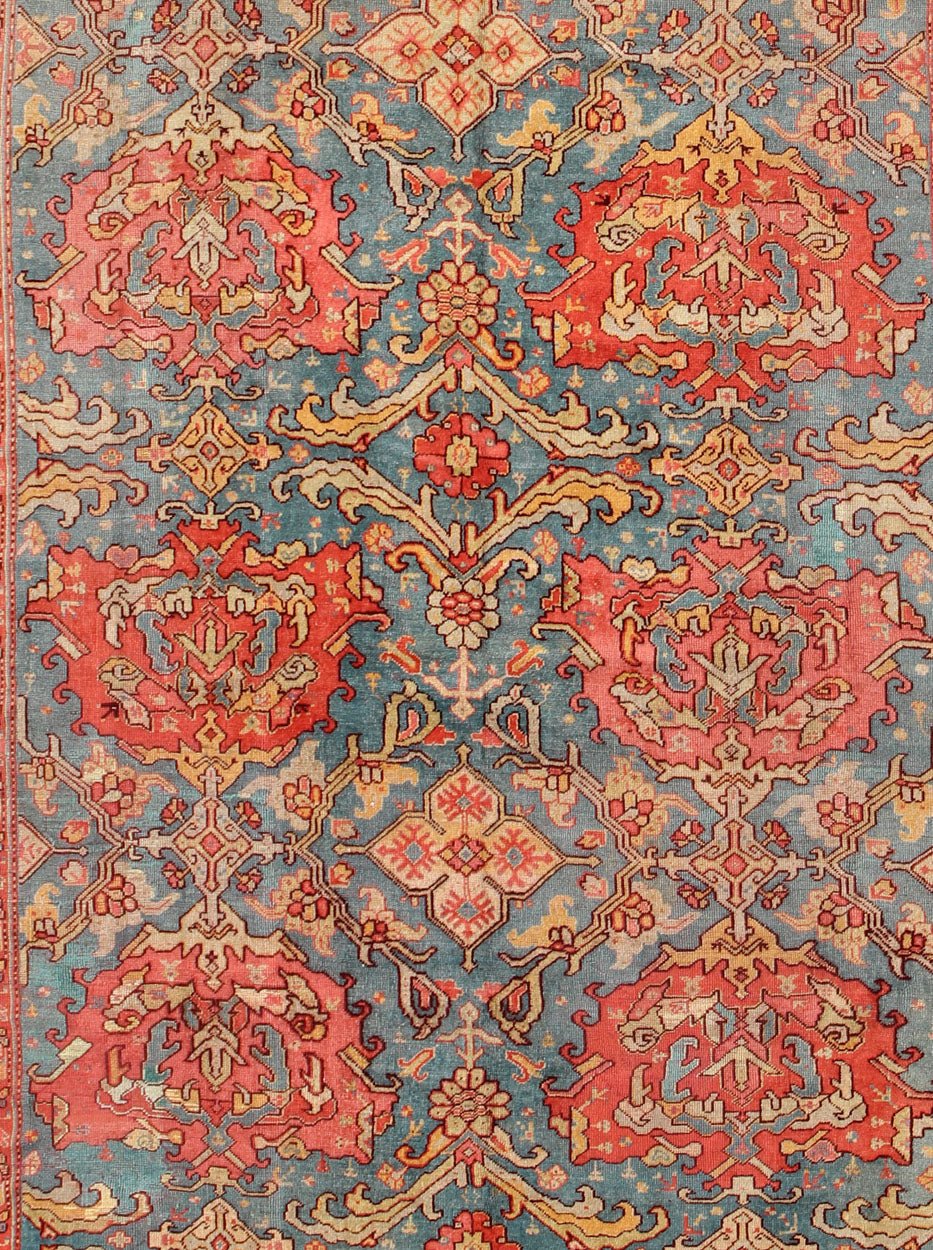 Antique Colorful Turkish Oushak Rug with Teal Color This wonderful Turkish Oushak rug is set on a teal - blue background. The eight over - sized medallions are opulent with two shades of coral and the same accent colors in the center field. The back... - Keivan Woven ArtsN15 - 1003 - 7014Rug