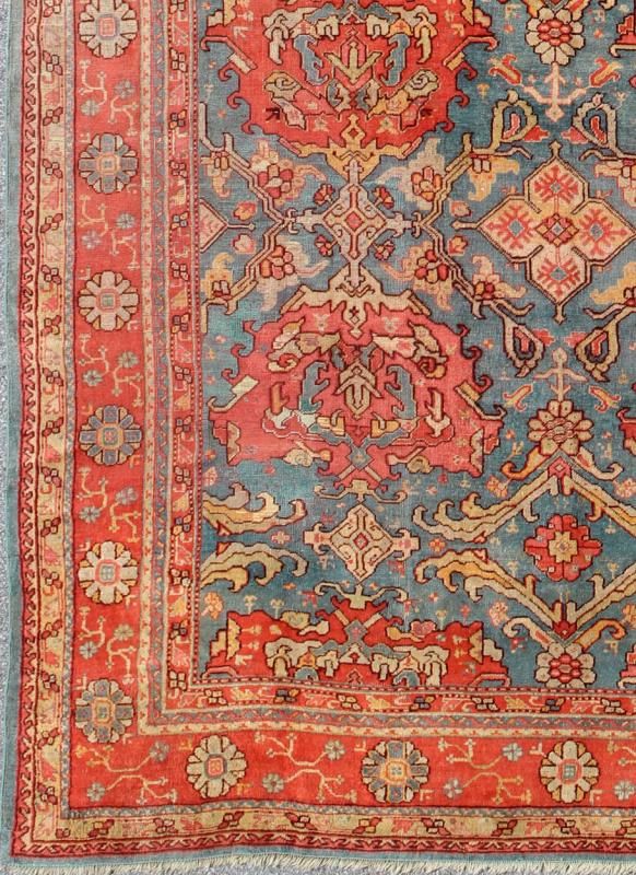 Antique Colorful Turkish Oushak Rug with Teal Color This wonderful Turkish Oushak rug is set on a teal - blue background. The eight over - sized medallions are opulent with two shades of coral and the same accent colors in the center field. The back... - Keivan Woven ArtsN15 - 1003 - 7014Rug