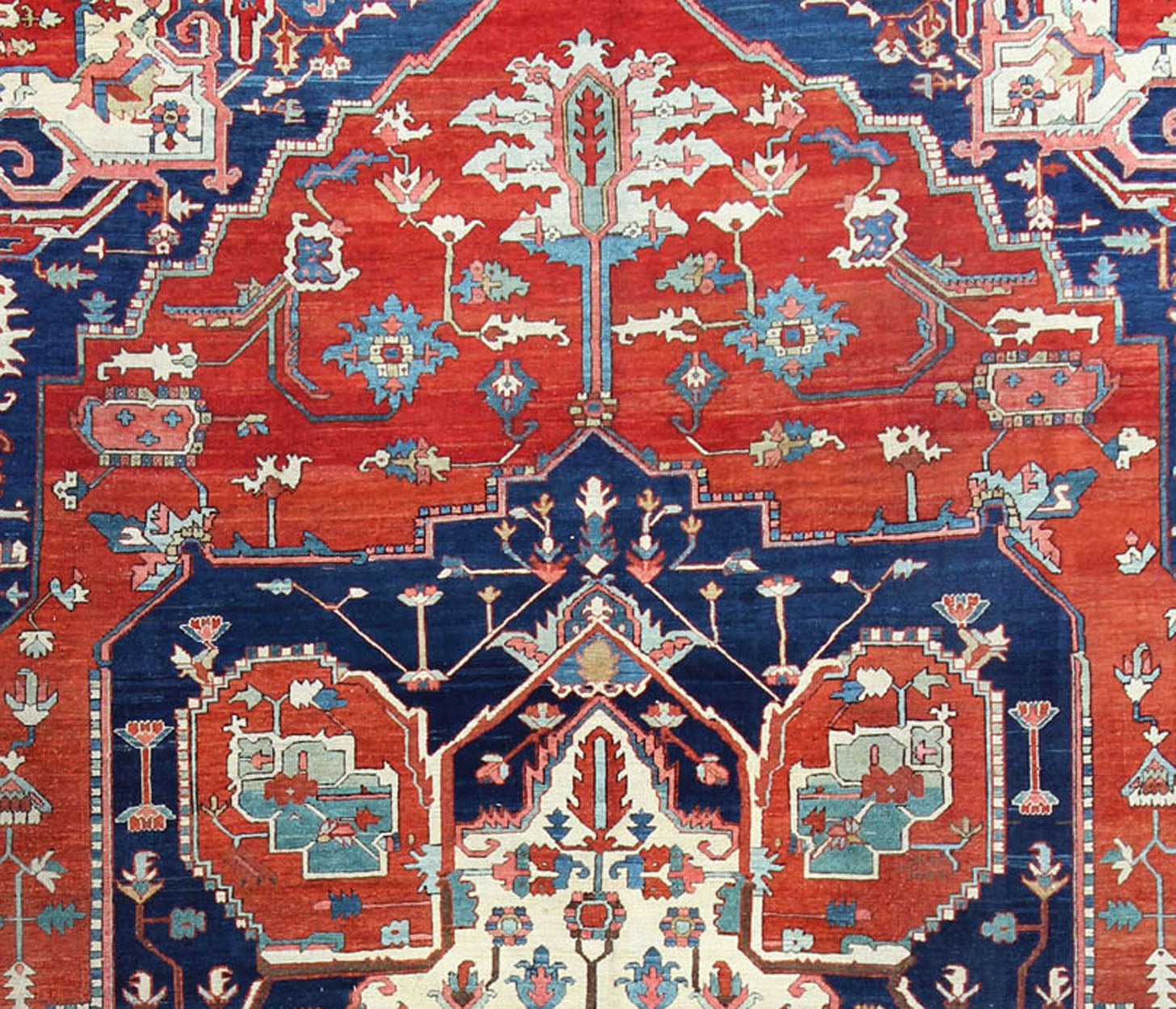 Antique Persian fine weave Serapi rug with large geometric medallion in brilliant colors and blue and tomato red. Keivan Woven Arts / Rug / N15 - 1204 / country of origin / type: Iran /Serapi, circa 1900. Measures: 10.3 x 14.4. Antique Serapi rugs... - Keivan Woven ArtsN15 - 1204 - 7889Rug