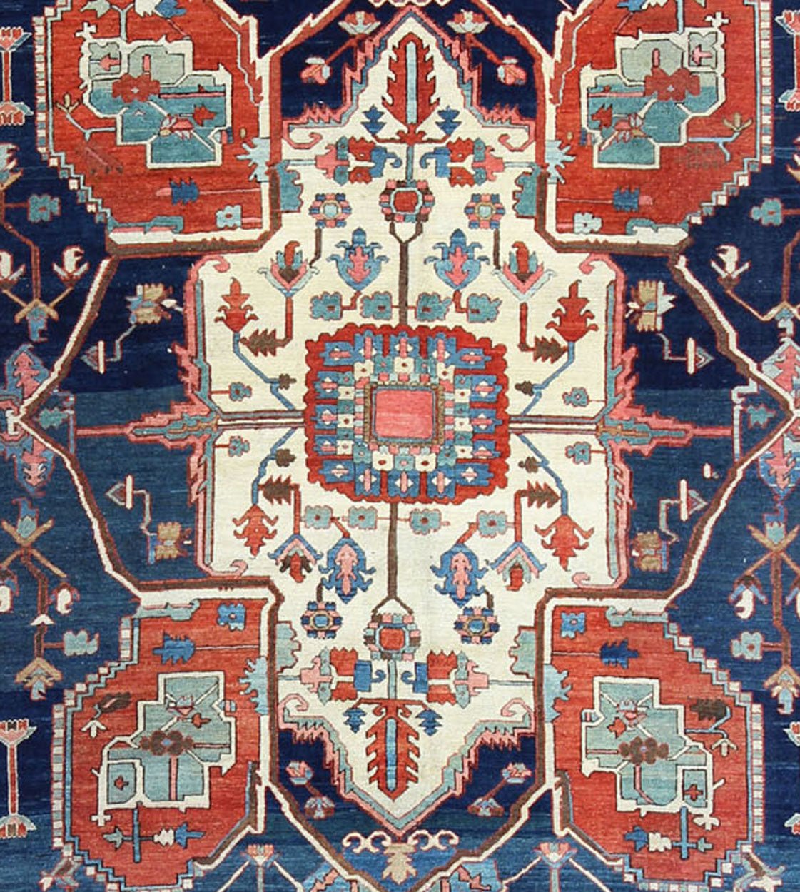 Antique Persian fine weave Serapi rug with large geometric medallion in brilliant colors and blue and tomato red. Keivan Woven Arts / Rug / N15 - 1204 / country of origin / type: Iran /Serapi, circa 1900. Measures: 10.3 x 14.4. Antique Serapi rugs... - Keivan Woven ArtsN15 - 1204 - 7889Rug