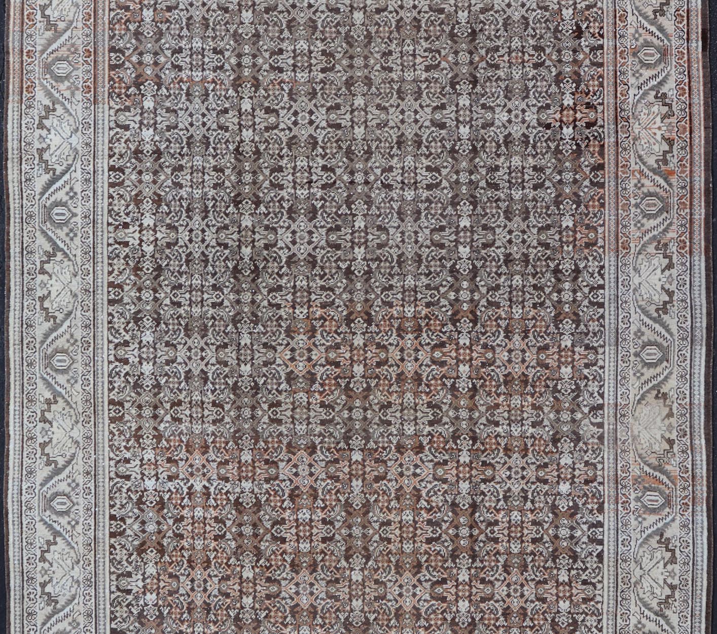 Antique Mahal Persian Carpet with All - Over Herati Design in Ivory, Gray & Brown. Keivan Woven Arts / rug NA - 170091, country of origin / type: Iran / Mahal, circa 1920. Measures: 10'4 x 17'3. This decorative Persian Mahal relies heavily on exquisi... - Keivan Woven ArtsNA - 170091 - 8601Rug