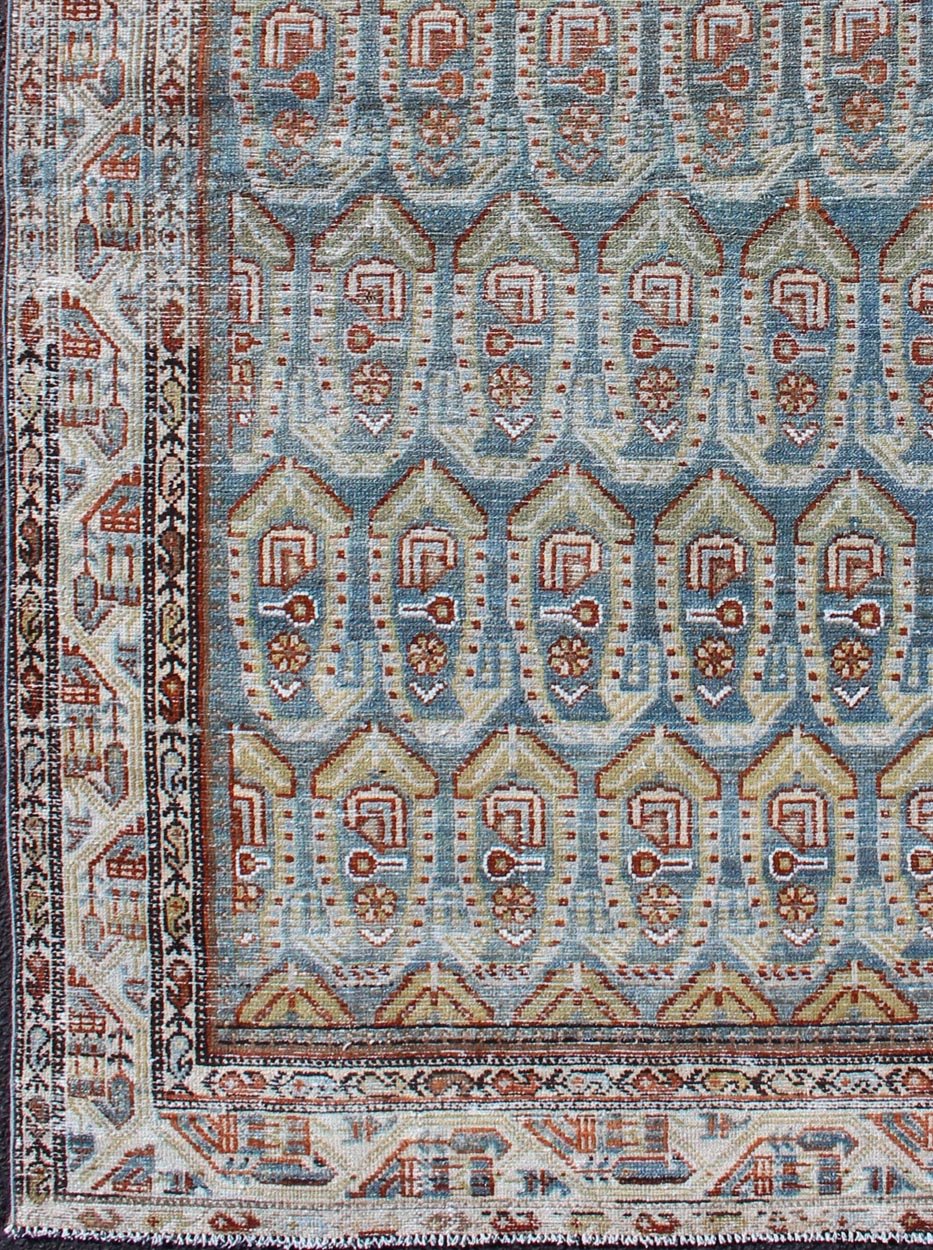 Blue and red Persian antique Malayer Rug with sub - geometric Paisley design, rug na - 180382, country of origin or type: Iran / Malayer, circa 1920. This magnificent antique Persian Malayer rug (circa 1920) bears a beautiful, expansive, all - over su... - Keivan Woven ArtsNA - 180382 - 10504Rug