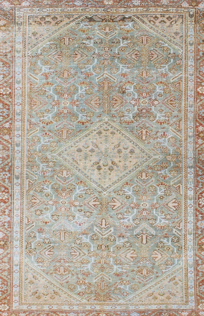 Persian Mahal antique rug with floral design in Peach, green, blue, and red colors with central Medallion, rug na - 180709, country of origin / type: Iran / Mahal, circa 1920. This antique Persian Mahal rug, circa early 20th century, relies heavil... - Keivan Woven ArtsNA - 180709 - 10512Rug