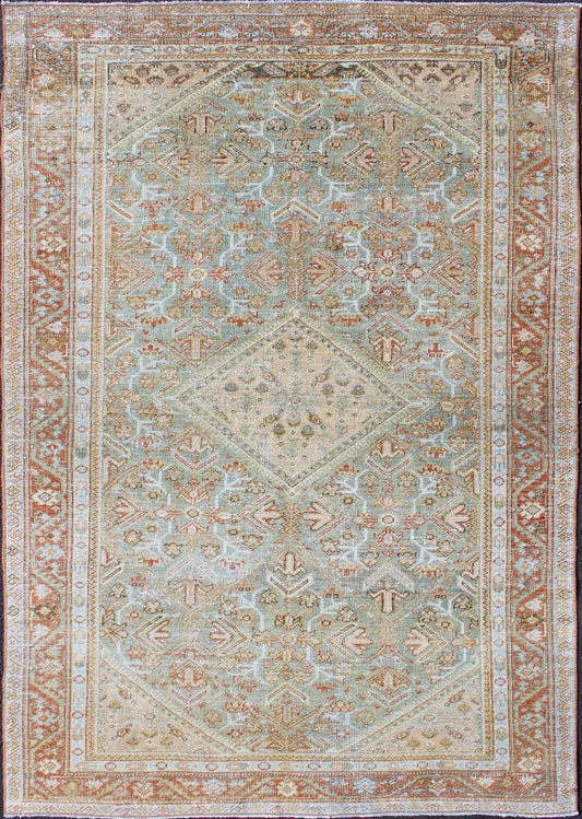 Persian Mahal antique rug with floral design in Peach, green, blue, and red colors with central Medallion, rug na - 180709, country of origin / type: Iran / Mahal, circa 1920. This antique Persian Mahal rug, circa early 20th century, relies heavil... - Keivan Woven ArtsNA - 180709 - 10512
