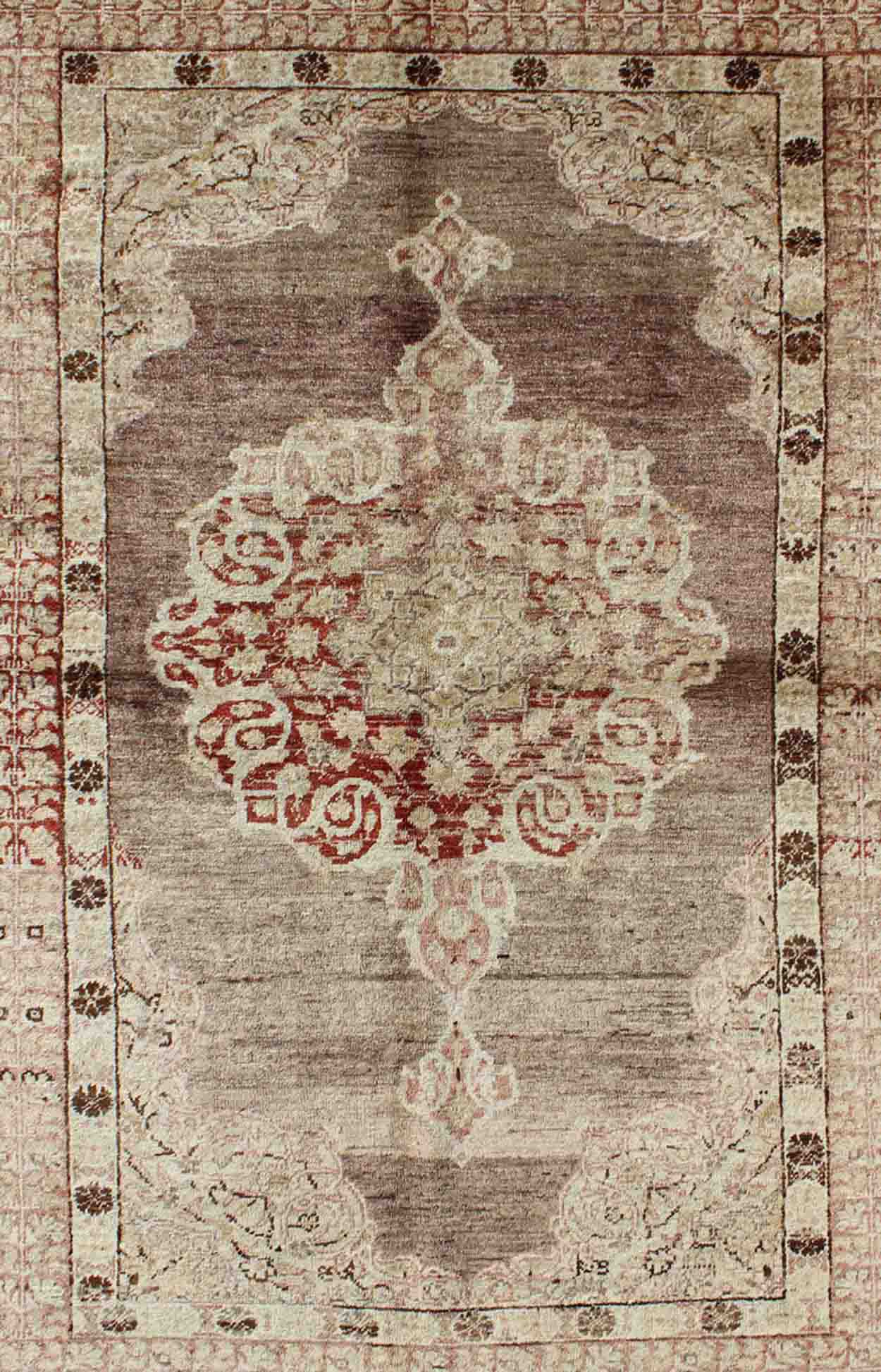 Vintage Oushak Rug with Center Medallion in Aubergine Oushak Vintage Rug with Aubergine with Center Medallion rug/na - 34, origin/turkey kwarugs This spectacular Vintage Turkish Oushak bears magnificent splendor indicative of royal tastes... - Keivan Woven ArtsNA - 34 - 1588Rug