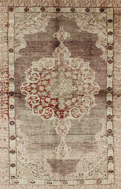 Vintage Oushak Rug with Center Medallion in Aubergine Oushak Vintage Rug with Aubergine with Center Medallion rug/na - 34, origin/turkey kwarugs This spectacular Vintage Turkish Oushak bears magnificent splendor indicative of royal tastes... - Keivan Woven ArtsNA - 34 - 1588Rug