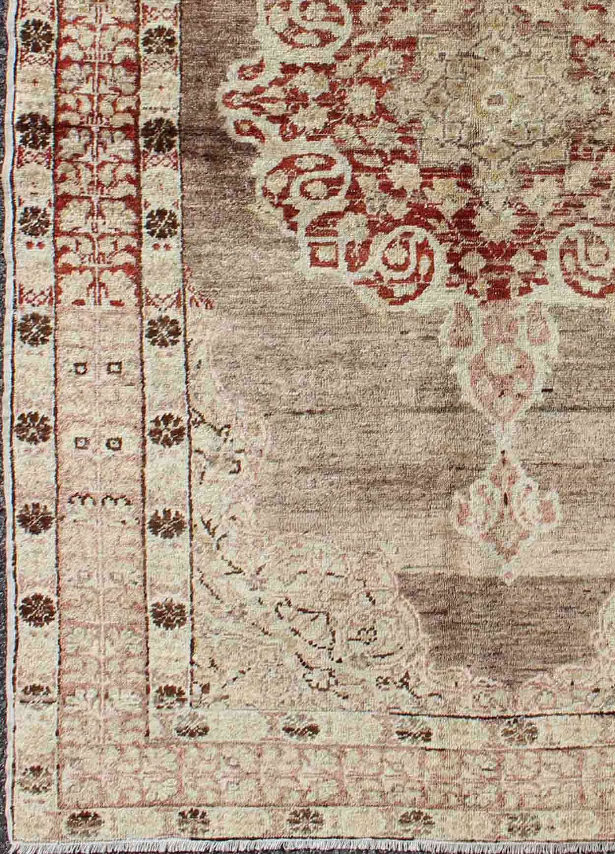 Vintage Oushak Rug with Center Medallion in Aubergine Oushak Vintage Rug with Aubergine with Center Medallion rug/na - 34, origin/turkey kwarugs This spectacular Vintage Turkish Oushak bears magnificent splendor indicative of royal tastes... - Keivan Woven ArtsNA - 34 - 1588Rug