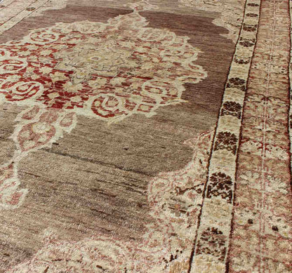 Vintage Oushak Rug with Center Medallion in Aubergine Oushak Vintage Rug with Aubergine with Center Medallion rug/na - 34, origin/turkey kwarugs This spectacular Vintage Turkish Oushak bears magnificent splendor indicative of royal tastes... - Keivan Woven ArtsNA - 34 - 1588Rug