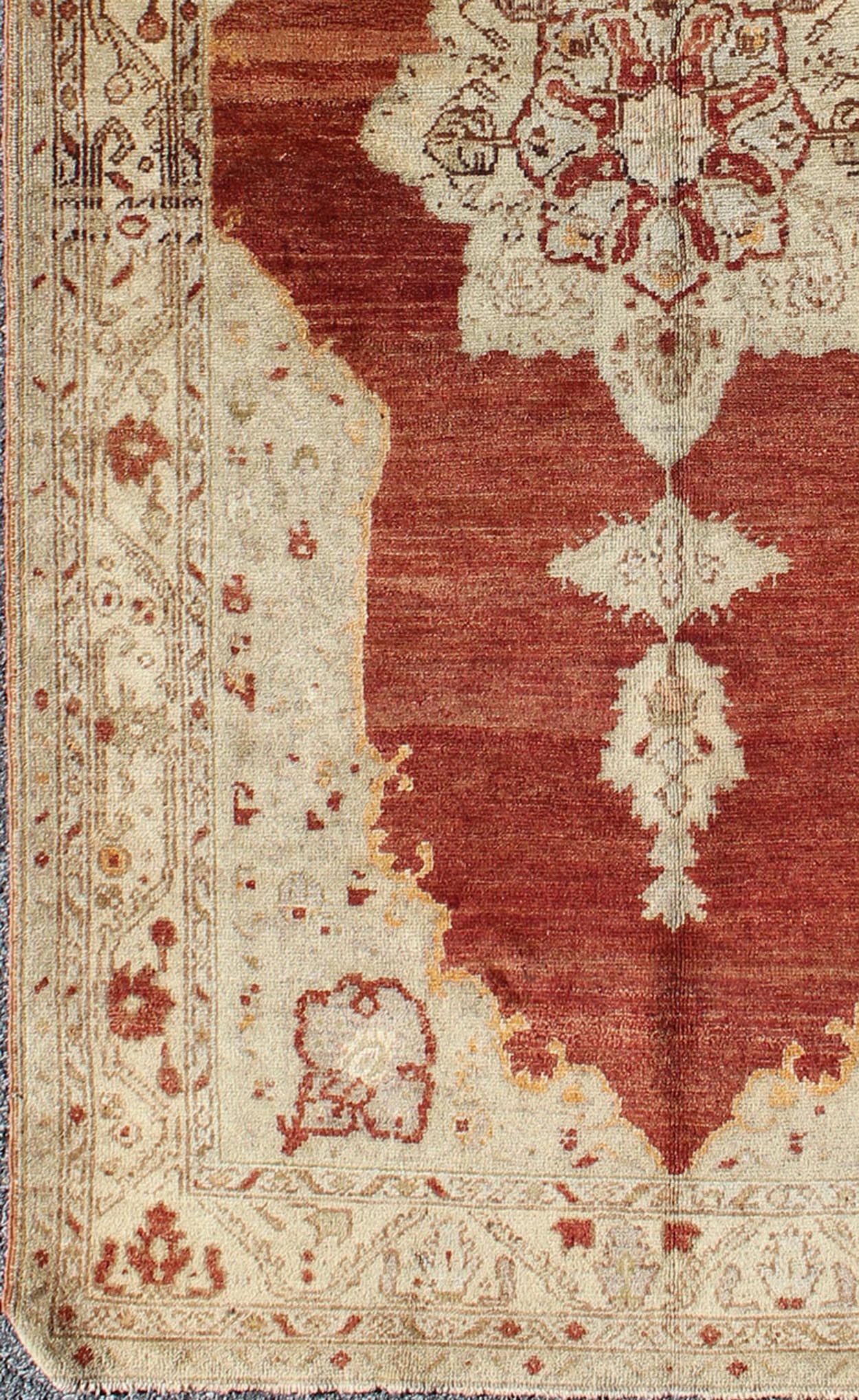 Antique Turkish Oushak rug with stretched medallion in red, ivory, cream, gray, rug na - 41519, country of origin / type: Turkey / Oushak, circa 1920 This vintage Turkish Oushak rug features an intricately beautiful design with a traditional aesth... - Keivan Woven ArtsNA - 41519 - 1152Rug