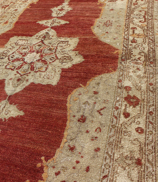 Antique Turkish Oushak rug with stretched medallion in red, ivory, cream, gray, rug na - 41519, country of origin / type: Turkey / Oushak, circa 1920 This vintage Turkish Oushak rug features an intricately beautiful design with a traditional aesth... - Keivan Woven ArtsNA - 41519 - 1152Rug