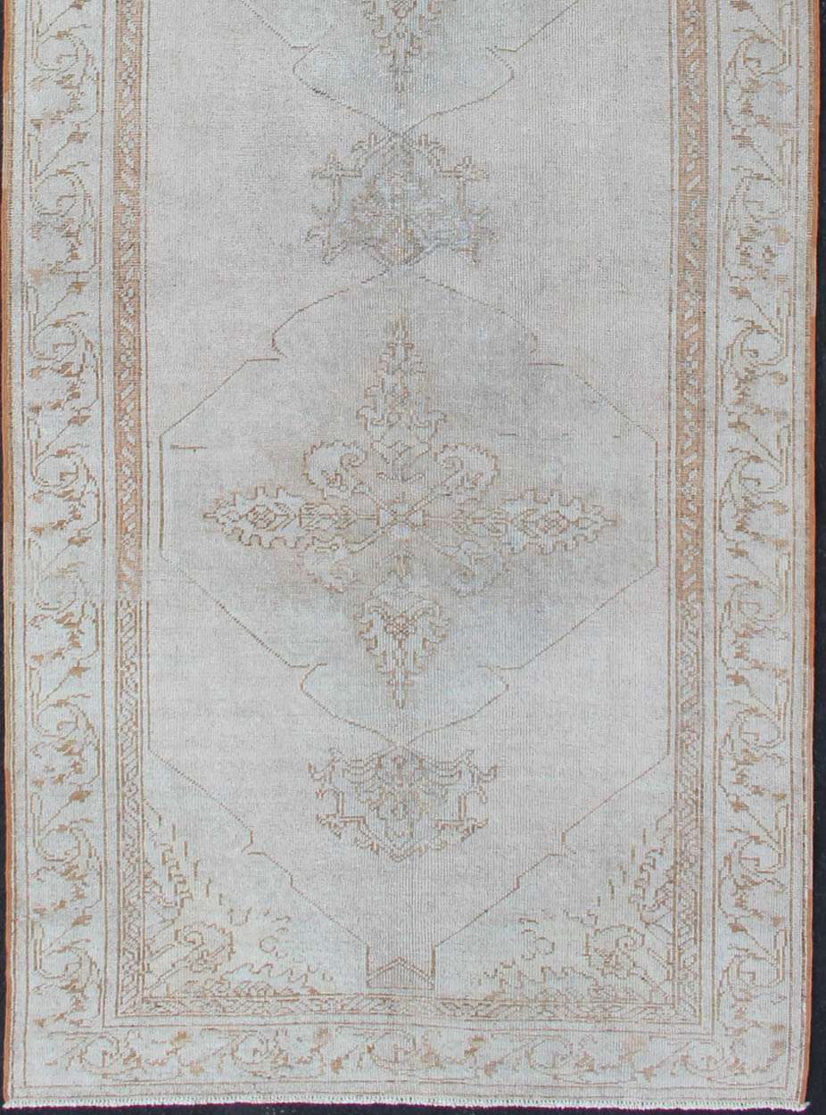 Vintage Turkish Oushak gallery runner with medallions in muted tones, rug na - 54280, country of origin / type: Turkey / Oushak, circa mid - 20th century This beautiful vintage Oushak runner from mid - 20th century Turkey features a classic Oushak des... - Keivan Woven ArtsNA - 54280 - 1400Rug