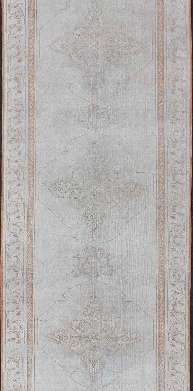 Vintage Turkish Oushak gallery runner with medallions in muted tones, rug na - 54280, country of origin / type: Turkey / Oushak, circa mid - 20th century This beautiful vintage Oushak runner from mid - 20th century Turkey features a classic Oushak des... - Keivan Woven ArtsNA - 54280 - 1400Rug