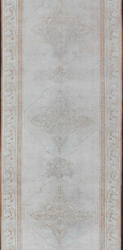 Vintage Turkish Oushak gallery runner with medallions in muted tones, rug na - 54280, country of origin / type: Turkey / Oushak, circa mid - 20th century This beautiful vintage Oushak runner from mid - 20th century Turkey features a classic Oushak des... - Keivan Woven ArtsNA - 54280 - 1400Rug
