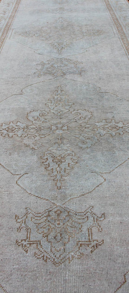 Vintage Turkish Oushak gallery runner with medallions in muted tones, rug na - 54280, country of origin / type: Turkey / Oushak, circa mid - 20th century This beautiful vintage Oushak runner from mid - 20th century Turkey features a classic Oushak des... - Keivan Woven ArtsNA - 54280 - 1400Rug
