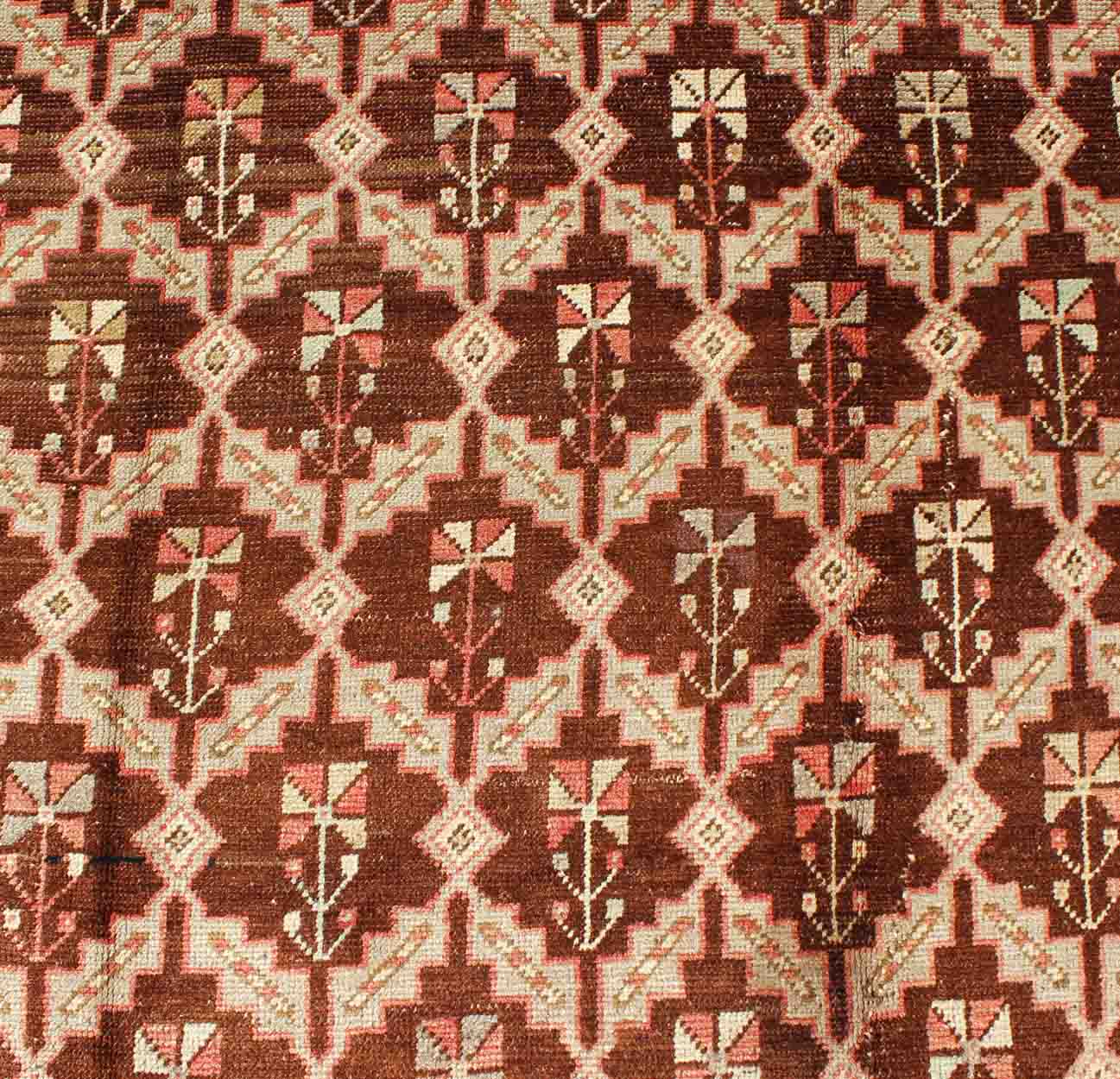 Unique Turkish Oushak Rug in Brown, Taupe, Pale Green, Butter and Coral. Keivan Woven Arts - Rug/ NA - 54536, Vintage Turkish Rug This wonderful Turkish Oushak has a chocolate brown background and a repeating pattern. Coral and ivory with hints of ... - Keivan Woven ArtsNA - 54536 - 928Rug