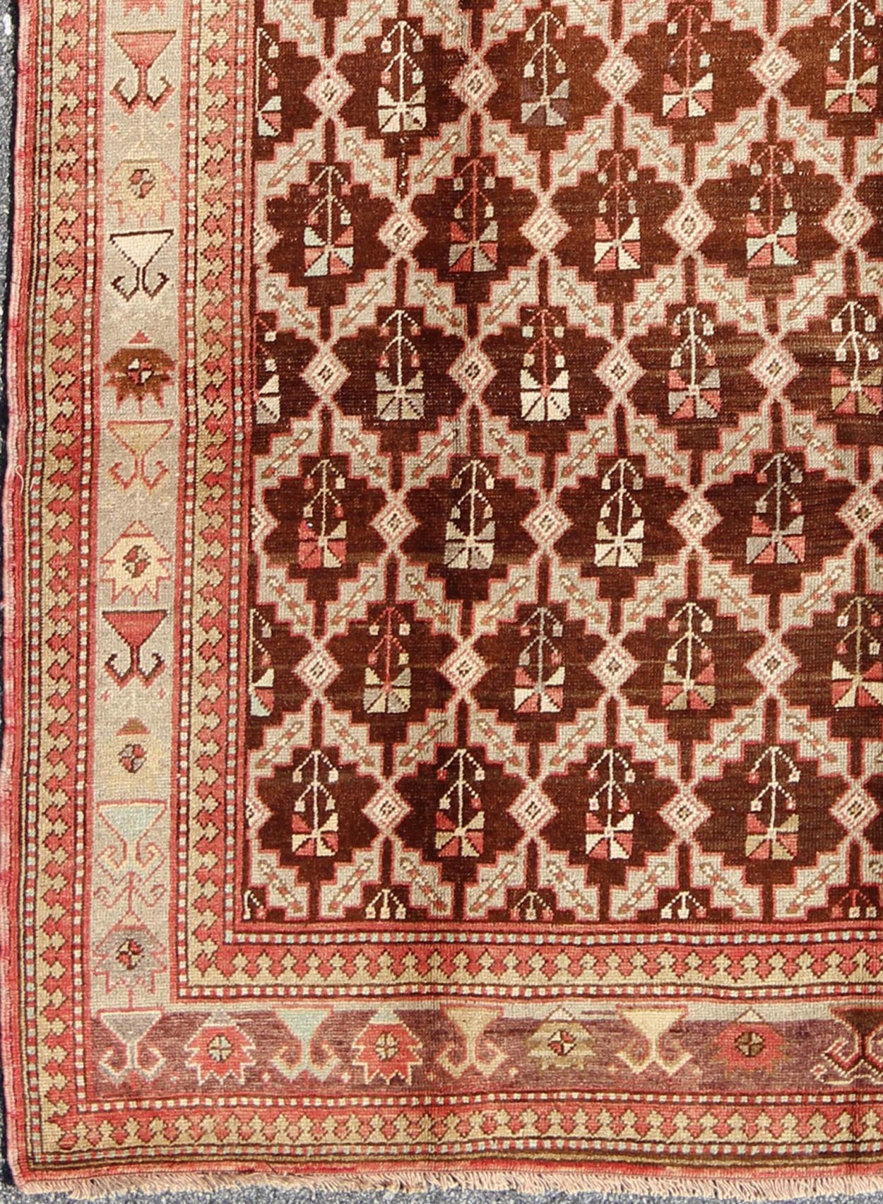 Unique Turkish Oushak Rug in Brown, Taupe, Pale Green, Butter and Coral. Keivan Woven Arts - Rug/ NA - 54536, Vintage Turkish Rug This wonderful Turkish Oushak has a chocolate brown background and a repeating pattern. Coral and ivory with hints of ... - Keivan Woven ArtsNA - 54536 - 928Rug
