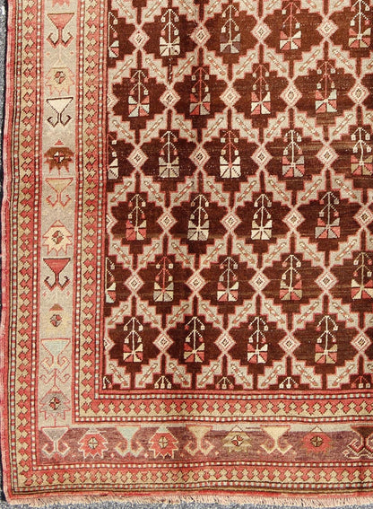 Unique Turkish Oushak Rug in Brown, Taupe, Pale Green, Butter and Coral. Keivan Woven Arts - Rug/ NA - 54536, Vintage Turkish Rug This wonderful Turkish Oushak has a chocolate brown background and a repeating pattern. Coral and ivory with hints of ... - Keivan Woven ArtsNA - 54536 - 928Rug