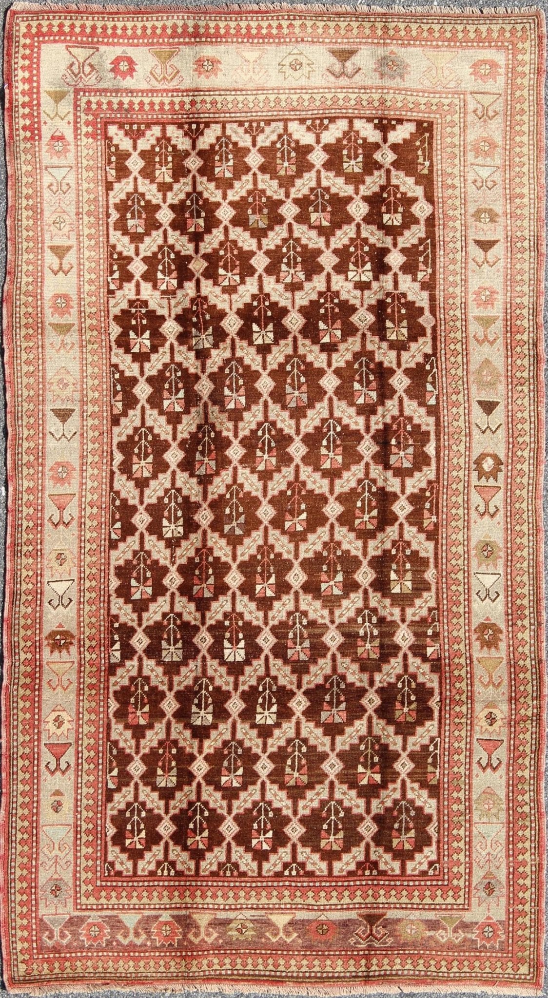 Unique Turkish Oushak Rug in Brown, Taupe, Pale Green, Butter and Coral. Keivan Woven Arts - Rug/ NA - 54536, Vintage Turkish Rug This wonderful Turkish Oushak has a chocolate brown background and a repeating pattern. Coral and ivory with hints of ... - Keivan Woven ArtsNA - 54536 - 928Rug