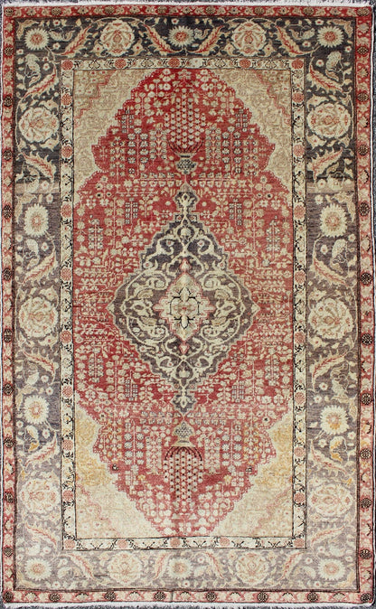 Antique Turkish Oushak Rug with Floral Medallion Design in Red and Charcoal Measures: 4'4 x 7'2 This antique Turkish Oushak carpet features a central medallion design, as well as patterns of smaller floral shapes and botanical elements ... - Keivan Woven ArtsNA - 54563 - 1066Rug