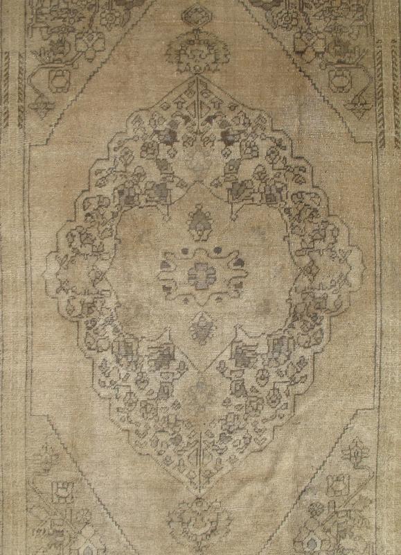 Antique Turkish Oushak with Stylized Medallion Design in Muted Neutral Tones This beautifully muted antique Turkish Oushak displays a stretched central medallion filled with Sub - geometric floral motifs and capped with palmettes. The saw - toothed ... - Keivan Woven ArtsNA - 54726 - 1582Rug