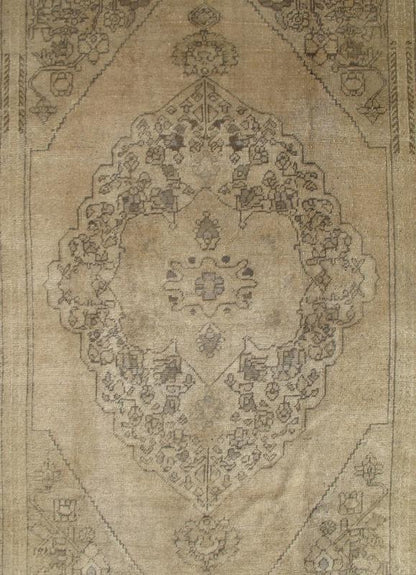 Antique Turkish Oushak with Stylized Medallion Design in Muted Neutral Tones This beautifully muted antique Turkish Oushak displays a stretched central medallion filled with Sub - geometric floral motifs and capped with palmettes. The saw - toothed ... - Keivan Woven ArtsNA - 54726 - 1582Rug