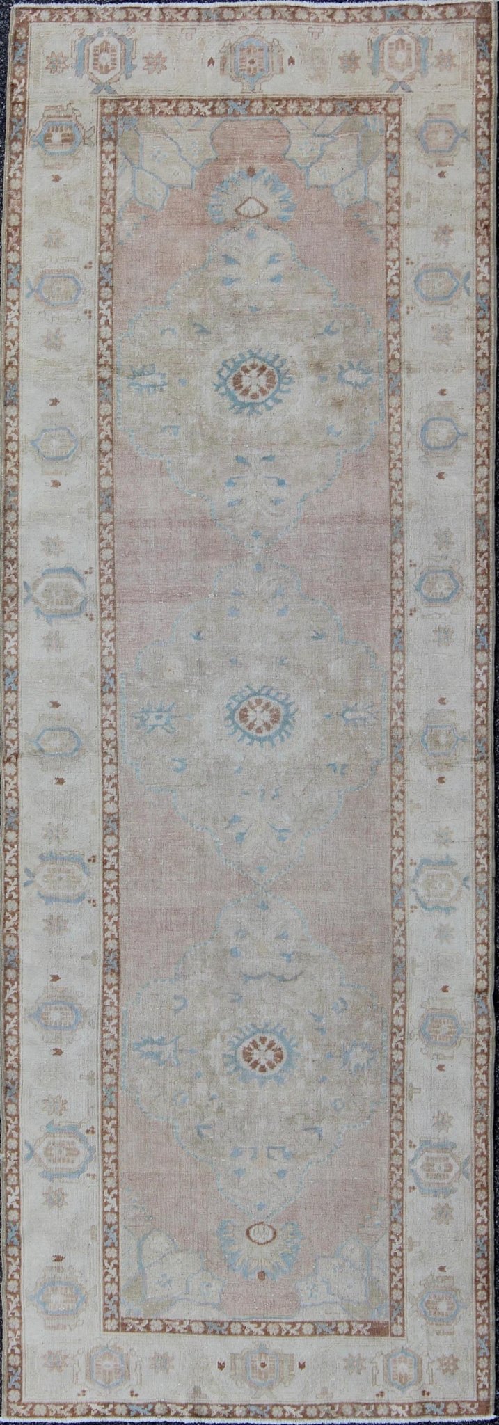 Pale pink, teal and ivory vintage Turkish Oushak runner with three medallions, rug na - 63085, country of origin / type: Turkey / Oushak, circa 1930 This beautiful vintage Oushak runner from early 20th century Turkey features a classic Oushak desi... - Keivan Woven ArtsNA - 63085 - 1428Rug