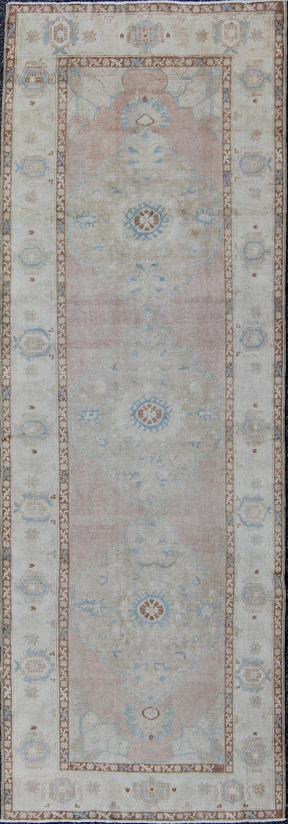 Pale pink, teal and ivory vintage Turkish Oushak runner with three medallions, rug na - 63085, country of origin / type: Turkey / Oushak, circa 1930 This beautiful vintage Oushak runner from early 20th century Turkey features a classic Oushak desi... - Keivan Woven ArtsNA - 63085 - 1428Rug