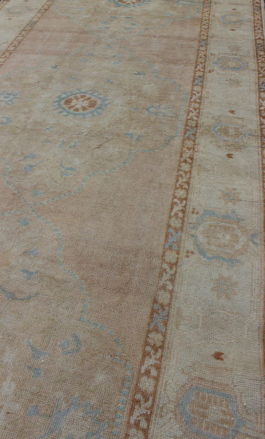 Pale pink, teal and ivory vintage Turkish Oushak runner with three medallions, rug na - 63085, country of origin / type: Turkey / Oushak, circa 1930 This beautiful vintage Oushak runner from early 20th century Turkey features a classic Oushak desi... - Keivan Woven ArtsNA - 63085 - 1428Rug