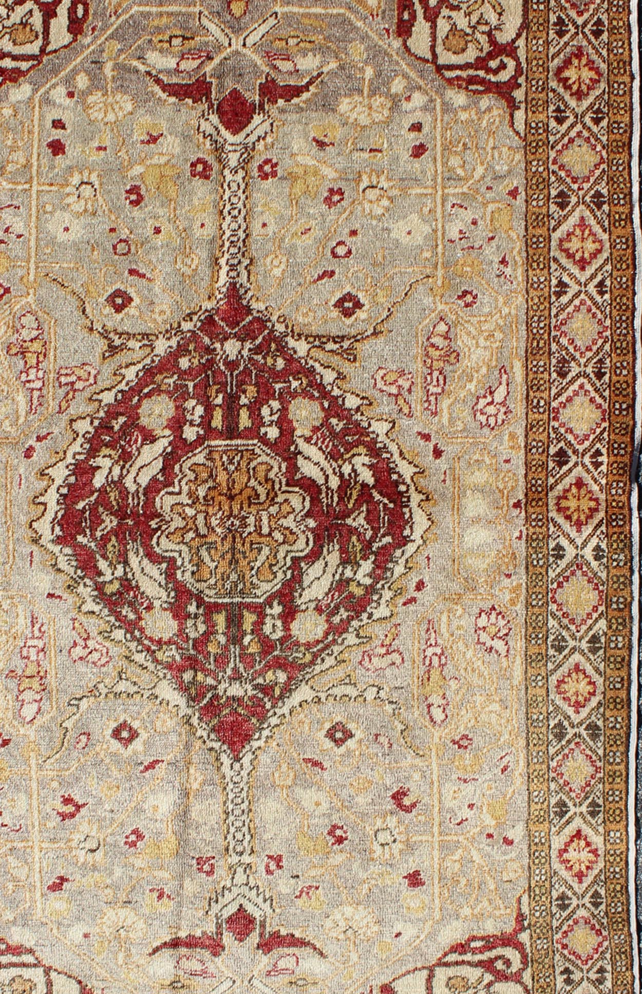 Vintage Turkish Medallion Oushak Area Rug in Red, Taupe, Gold, and Cocoa Measures: 4 x 6'8 This vintage Turkish Oushak carpet (circa mid - 20th century) features a central medallion design, as well as patterns of smaller floral shapes and b... - Keivan Woven ArtsNA - 63769 - 2131Rug