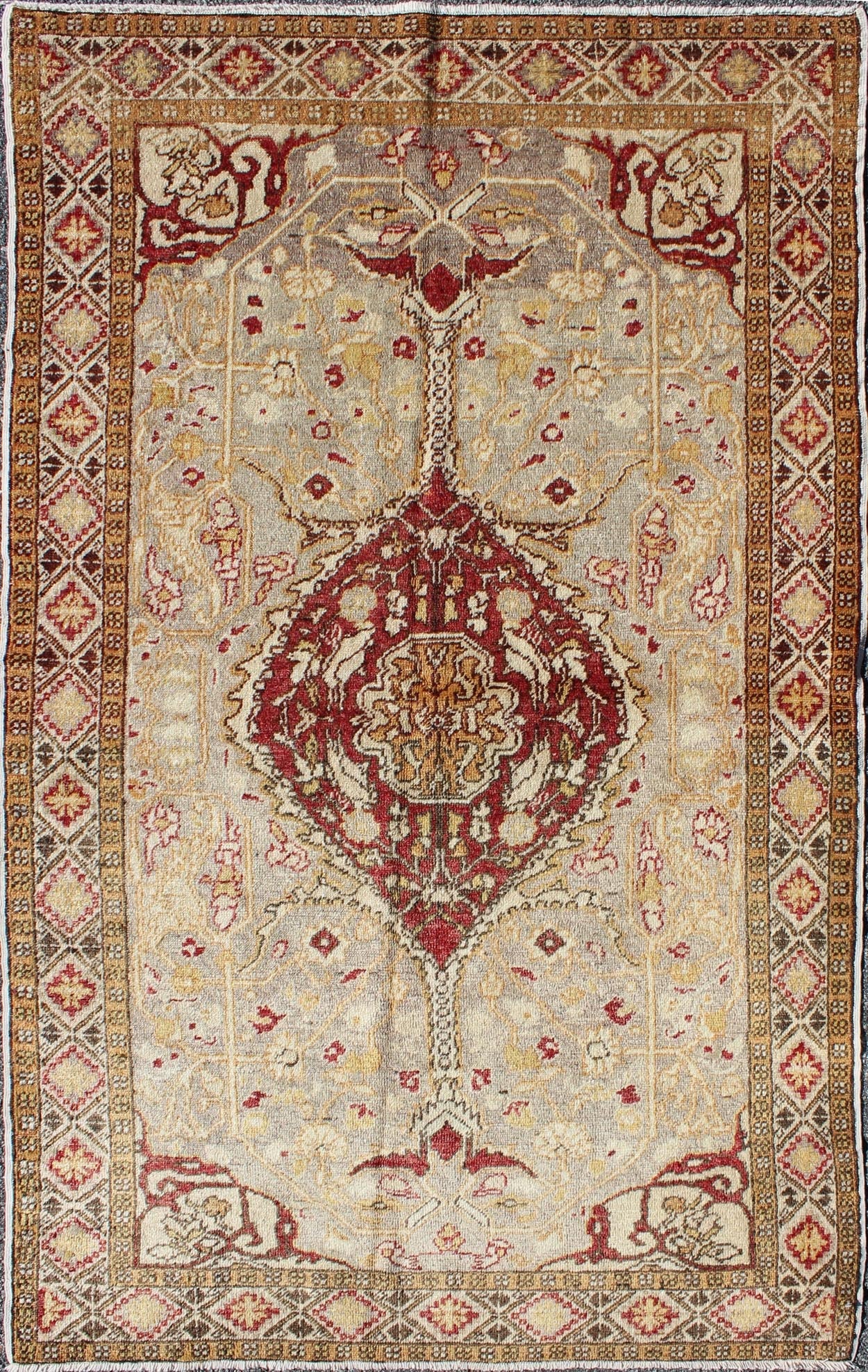 Vintage Turkish Medallion Oushak Area Rug in Red, Taupe, Gold, and Cocoa Measures: 4 x 6'8 This vintage Turkish Oushak carpet (circa mid - 20th century) features a central medallion design, as well as patterns of smaller floral shapes and b... - Keivan Woven ArtsNA - 63769 - 2131Rug