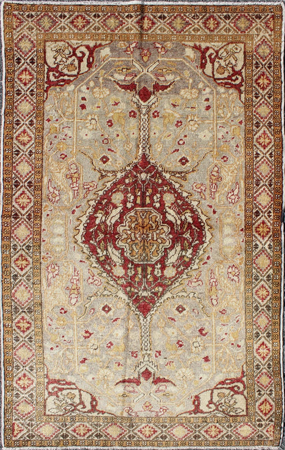 Vintage Turkish Medallion Oushak Area Rug in Red, Taupe, Gold, and Cocoa Measures: 4 x 6'8 This vintage Turkish Oushak carpet (circa mid - 20th century) features a central medallion design, as well as patterns of smaller floral shapes and b... - Keivan Woven ArtsNA - 63769 - 2131Rug