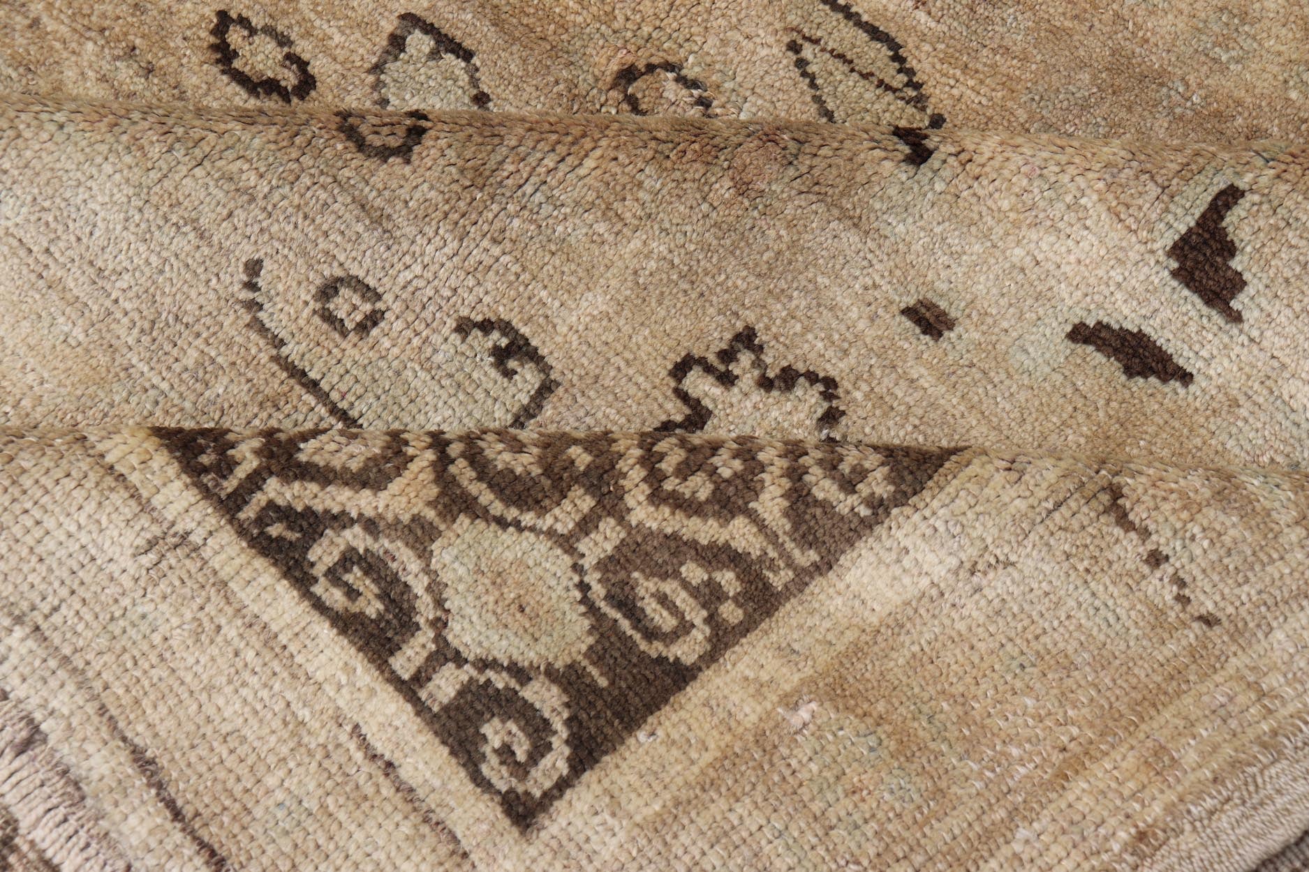 Unique Turkish Oushak With Overall Design in Cream, Gray and Brown Highlights Measures 5'10 x 9'5 This antique Oushak was hand - knotted in early 1900's Turkey. The copper - tan field displays a design not common for the era, an almost abstr... - Keivan Woven ArtsNA - 63794 - 942Rug