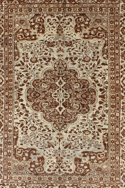 Measures: 5'1 x 7'3 This century - old Sivas displays an ivory field surrounded by a richly detailed classical arabesque design, with an intricate center medallion in the field that animates the tone and plays off of the finely detailed texture ... - Keivan Woven ArtsNA - 63818 - 1036Rug