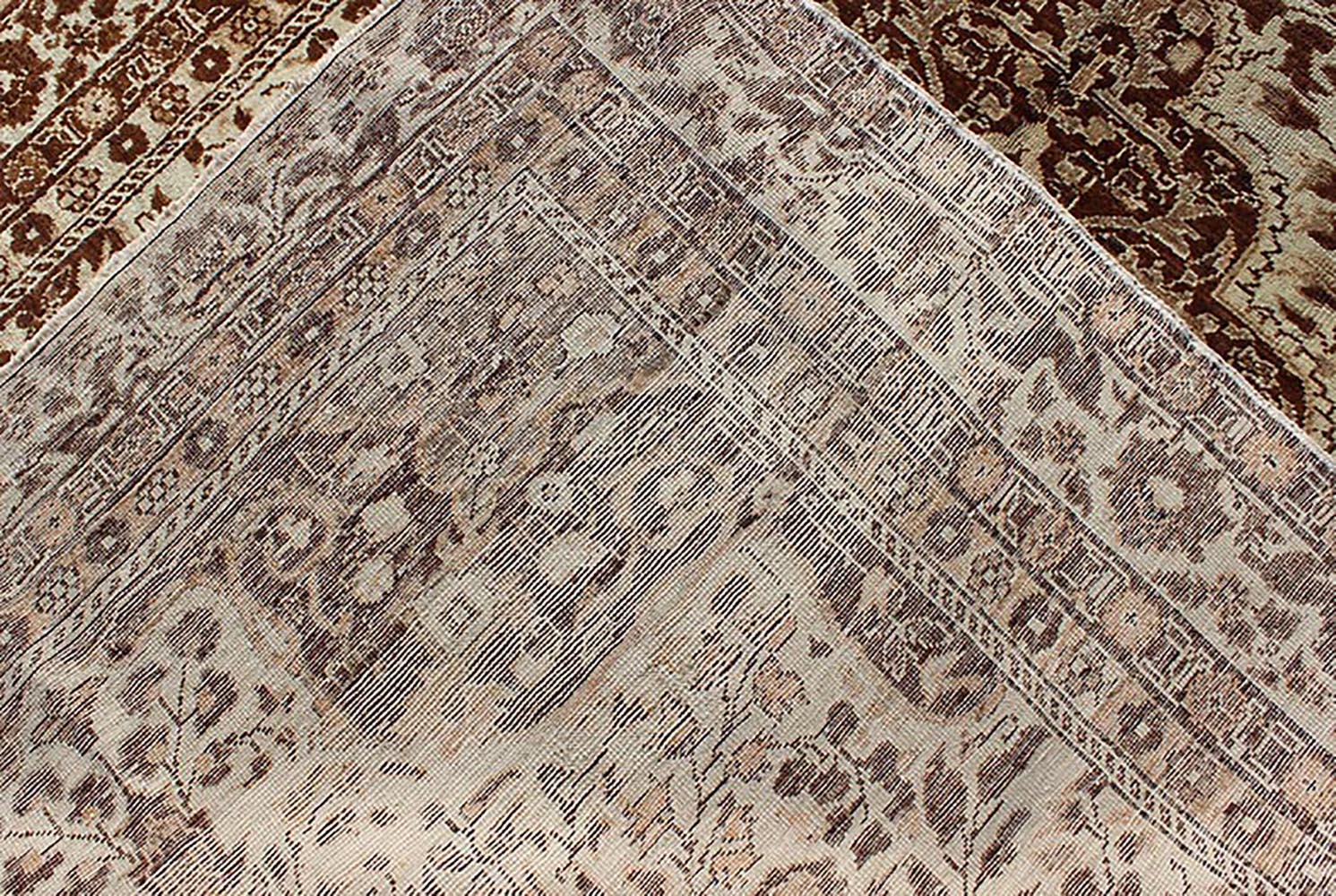 Measures: 5'1 x 7'3 This century - old Sivas displays an ivory field surrounded by a richly detailed classical arabesque design, with an intricate center medallion in the field that animates the tone and plays off of the finely detailed texture ... - Keivan Woven ArtsNA - 63818 - 1036Rug