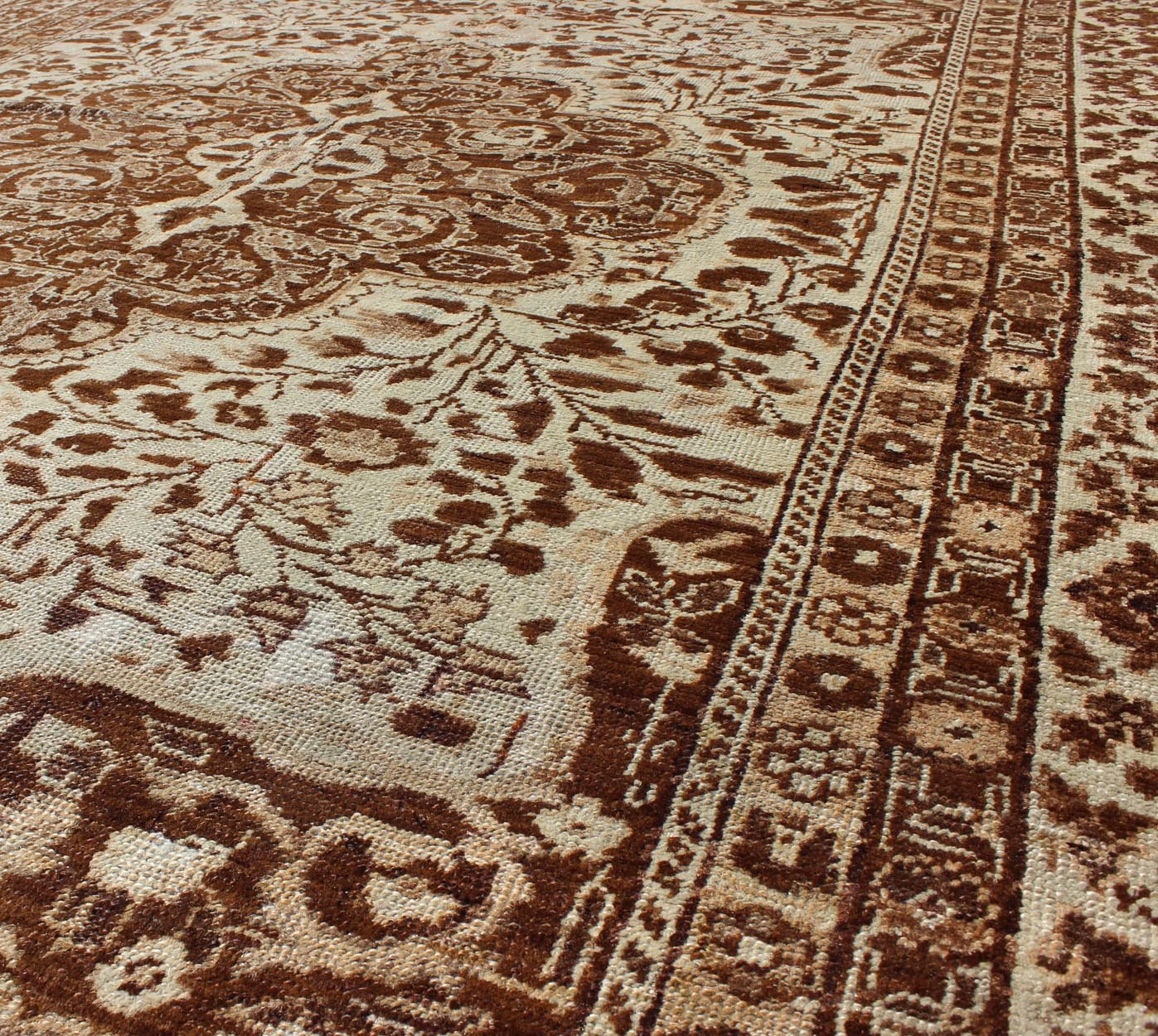 Measures: 5'1 x 7'3 This century - old Sivas displays an ivory field surrounded by a richly detailed classical arabesque design, with an intricate center medallion in the field that animates the tone and plays off of the finely detailed texture ... - Keivan Woven ArtsNA - 63818 - 1036Rug