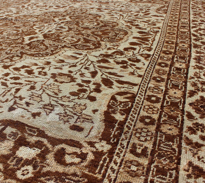 Measures: 5'1 x 7'3 This century - old Sivas displays an ivory field surrounded by a richly detailed classical arabesque design, with an intricate center medallion in the field that animates the tone and plays off of the finely detailed texture ... - Keivan Woven ArtsNA - 63818 - 1036Rug