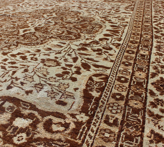 Measures: 5'1 x 7'3 This century - old Sivas displays an ivory field surrounded by a richly detailed classical arabesque design, with an intricate center medallion in the field that animates the tone and plays off of the finely detailed texture ... - Keivan Woven ArtsNA - 63818 - 1036Rug