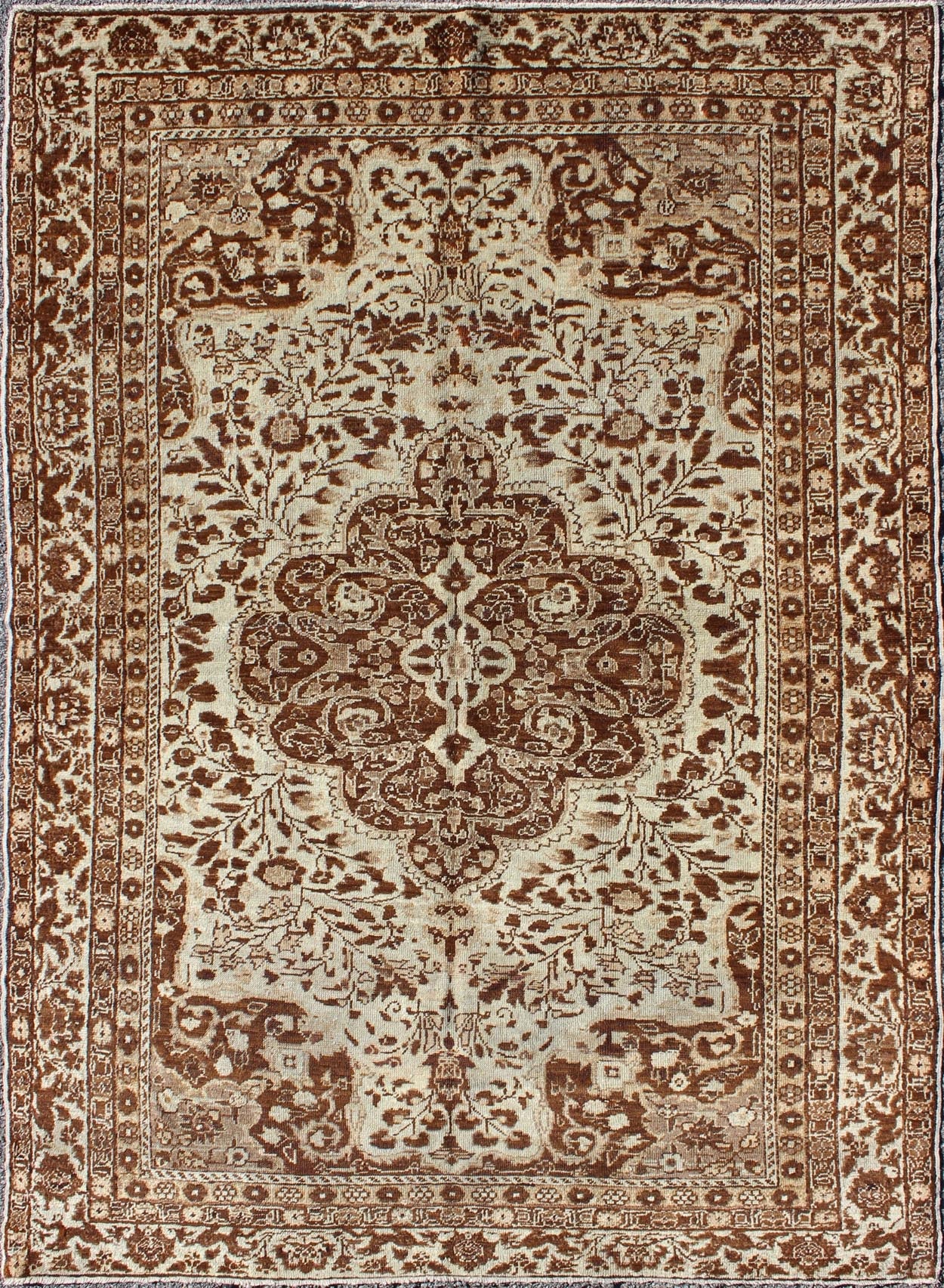 Measures: 5'1 x 7'3 This century - old Sivas displays an ivory field surrounded by a richly detailed classical arabesque design, with an intricate center medallion in the field that animates the tone and plays off of the finely detailed texture ... - Keivan Woven ArtsNA - 63818 - 1036Rug