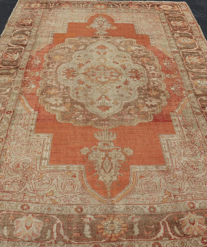 Antique Turkish Oushak Rug with Floral Medallion Burnt Orange and Cream. Keivan Woven Arts / rug NA - 639810, country of origin / type: Turkey / Oushak, circa 1910 Measures: 8'2 x 12'11. This antique Turkish Oushak carpet (circa 1910) features a fl... - Keivan Woven ArtsNA - 639810 - 723Rug