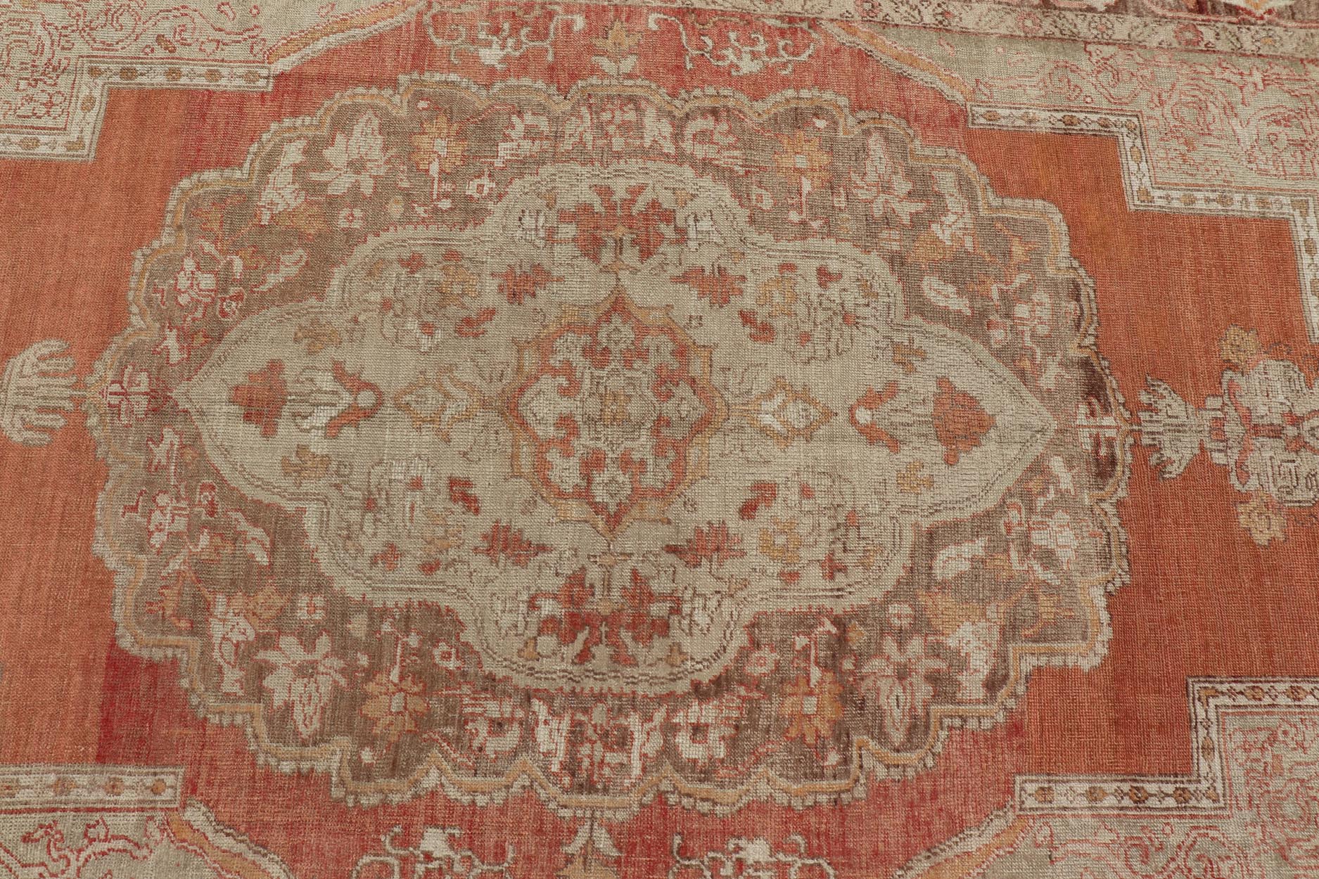 Antique Turkish Oushak Rug with Floral Medallion Burnt Orange and Cream. Keivan Woven Arts / rug NA - 639810, country of origin / type: Turkey / Oushak, circa 1910 Measures: 8'2 x 12'11. This antique Turkish Oushak carpet (circa 1910) features a fl... - Keivan Woven ArtsNA - 639810 - 723Rug