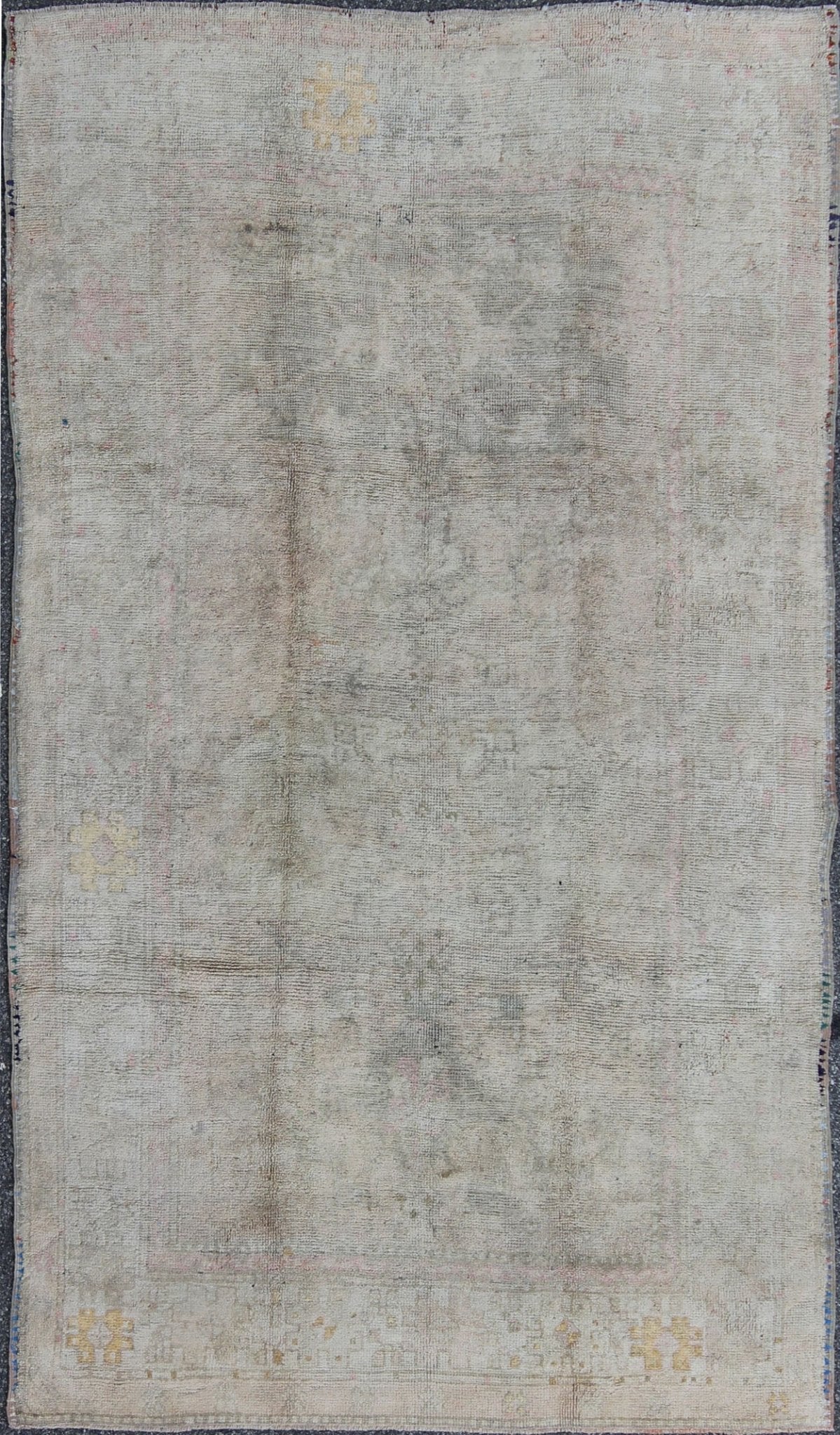 Muted Vintage Turkish Oushak Rug with Central Medallion in Gray, Ivory, Brown, rug na - 74312, country of origin / type: Turkey / Oushak, circa mid - 20th century This Turkish Oushak carpet features a central medallion design, as well as patterns of... - Keivan Woven ArtsNA - 74312 - 948Rug