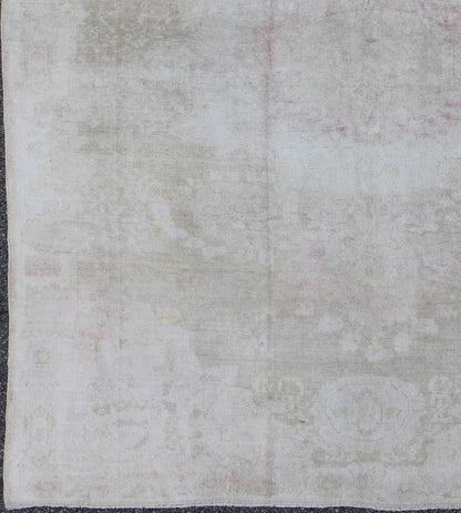 Antique Turkish Konya Area Rug in Gray & Soft Pink with Subtle Design Measures: 7.3 x 8.8 This intricate antique Turkish Konya carpet features a muted color palette of taupe, light gray, and ash pink, with a beautiful botanical central m... - Keivan Woven ArtsNA - 75054 - 794Rug