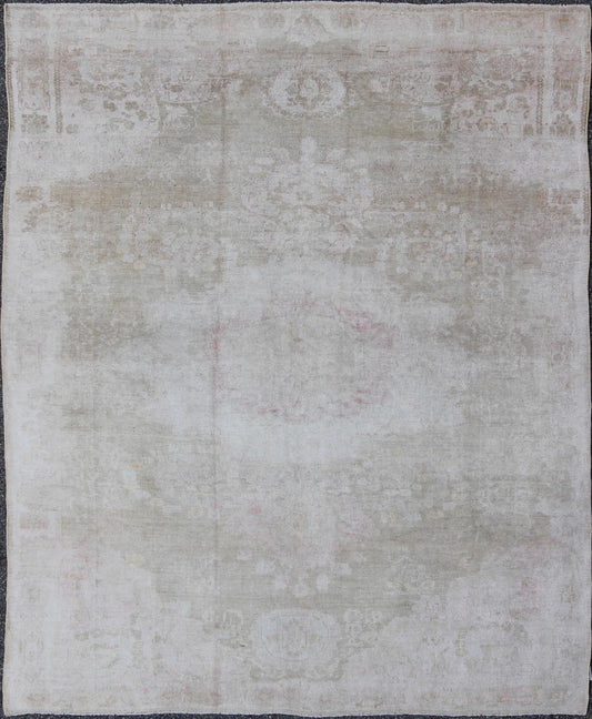 Antique Turkish Konya Area Rug in Gray & Soft Pink with Subtle Design Measures: 7.3 x 8.8 This intricate antique Turkish Konya carpet features a muted color palette of taupe, light gray, and ash pink, with a beautiful botanical central m... - Keivan Woven ArtsNA - 75054 - 794Rug